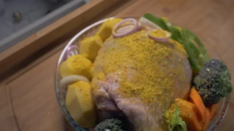 Raw chicken and vegetables with spices Видео 102995197