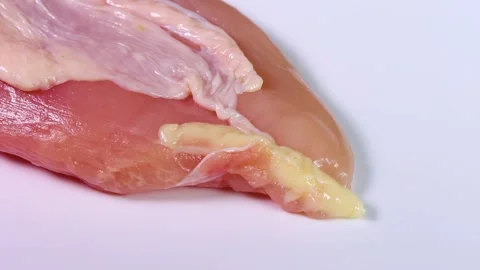 Raw chicken breast close up, rotating Video stock 308835501