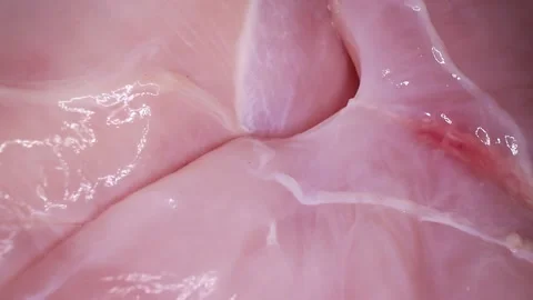 Raw Chicken Breast Texture Closeup Video Seamless Looping Video stock 140136041