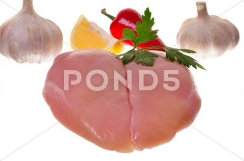 Raw chicken breast with vegetables Stock Photos