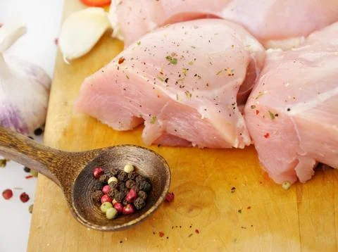 Raw chicken breasts Stock Photos