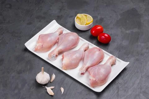 Raw chicken drum stick Stock Photos