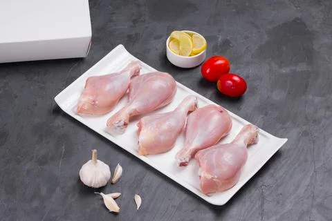 Raw chicken drum stick Stock Photos