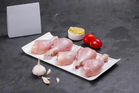 Raw chicken drum stick Stock Photos