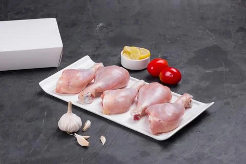 Raw chicken drum stick Stock Photos