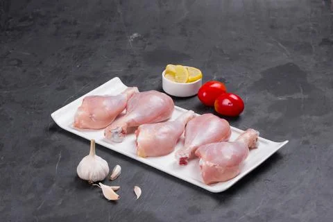 Raw chicken drum stick Stock Photos
