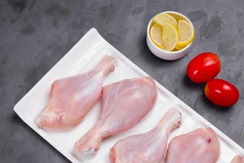 Raw chicken drum stick Stock Photos