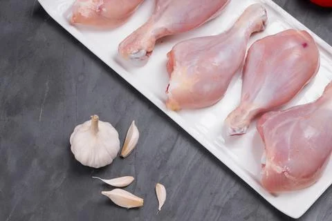 Raw chicken drum stick Stock Photos