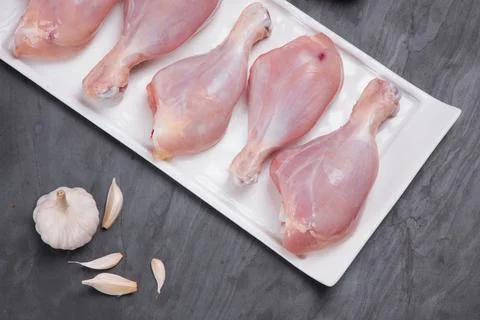 Raw chicken drum stick Stock Photos