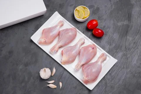 Raw chicken drum stick Foto stock
