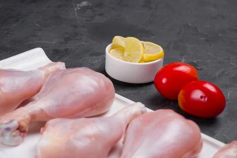 Raw chicken drum stick Stock Photos