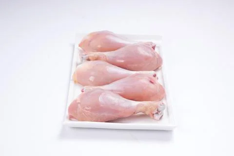 Raw chicken drum stick Stock Photos