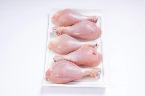 Raw chicken drum stick Stock Photos