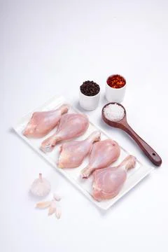 Raw chicken drum stick Stock Photos