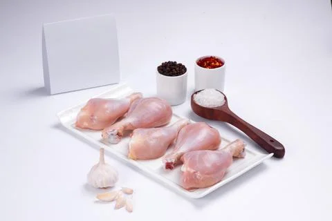 Raw chicken drum stick Stock Photos