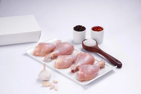 Raw chicken drum stick Stock Photos