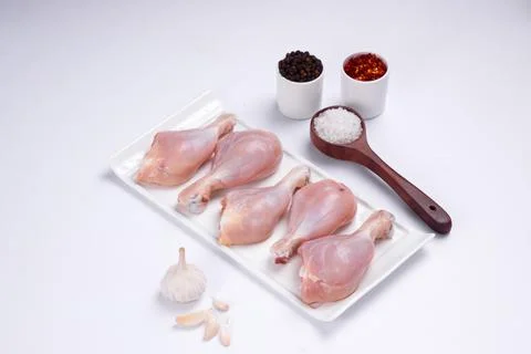 Raw chicken drum stick Stock Photos