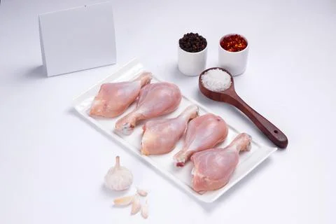 Raw chicken drum stick Foto stock