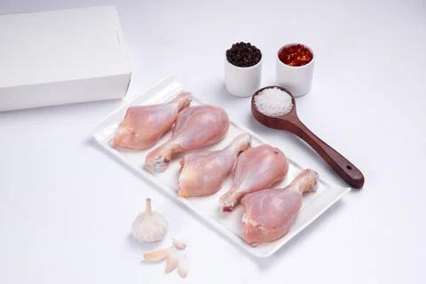 Raw chicken drum stick Stock Photos