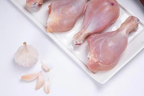 Raw chicken drum stick Stock Photos
