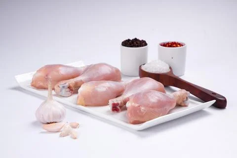 Raw chicken drum stick Stock Photos