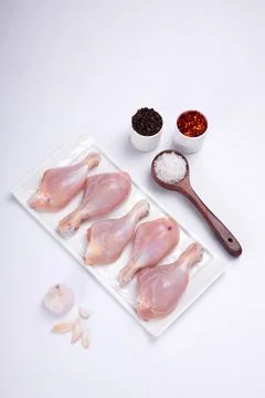 Raw chicken drum stick Stock Photos