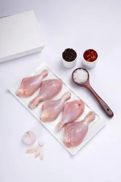 Raw chicken drum stick Foto stock