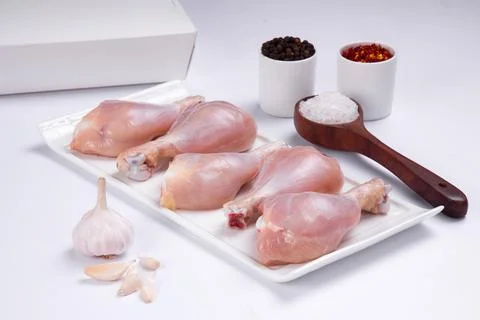 Raw chicken drum stick Stock Photos