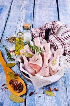 Raw chicken drumstick Stock Photos