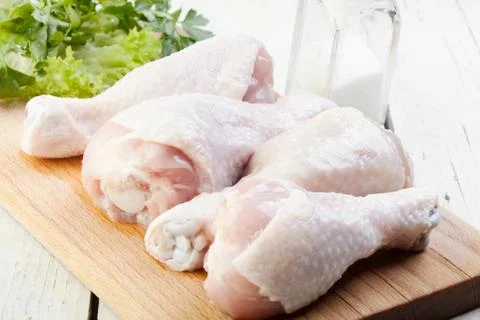 Raw chicken drumsticks Stock Photos