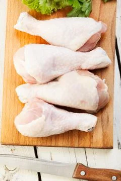 Raw chicken drumsticks Stock Photos