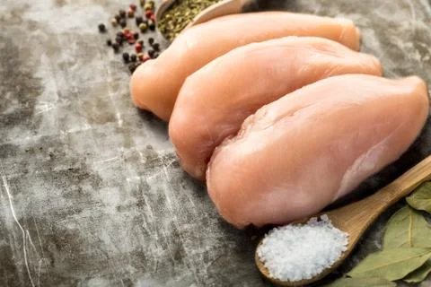 Raw chicken fillet Stock Photos