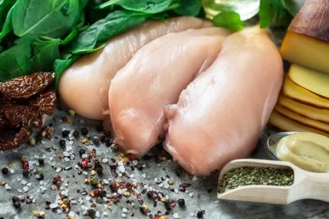 Raw chicken fillet Stock Photos