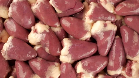 Raw chicken hearts top view, rotation Stock-Footage 225069455