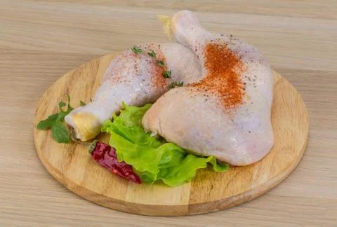 Raw chicken leg Stock Photos