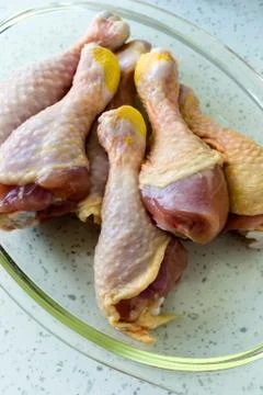 Raw chicken legs Stock Photos