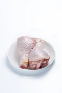 Raw chicken legs Stock Photos
