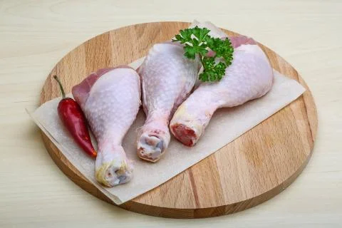 Raw chicken legs Stock Photos
