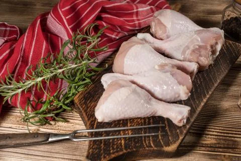 Raw chicken legs. Stock Photos