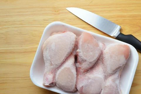 Raw chicken legs Stock Photos