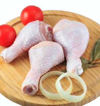 Raw chicken legs on a white background Stock Photos