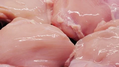 Raw chicken meat. Chunks of fresh organic meat. Prepare dish with chicken on pan Stock Footage 306162811