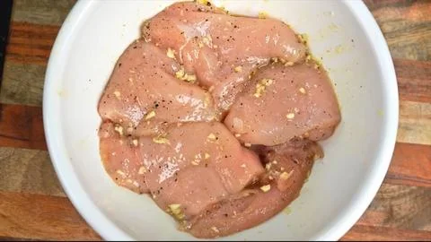 Raw chicken meat marinated top view Stock Photos