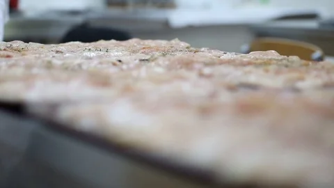 Raw chicken ready for marinade with lemon and pepper. Professional chef in  Stock Footage 90665975