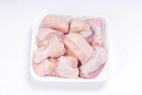 Raw chicken tender curry cut with  skin Stock Photos