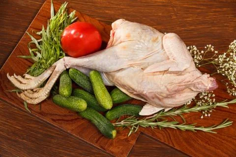 Raw chicken with vegetables Foto stock