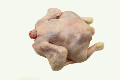 Raw chicken on the white background Stock Photos