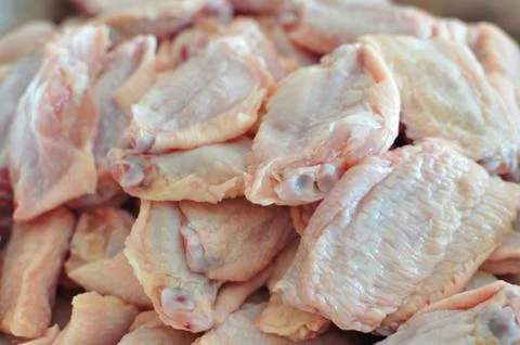 Raw chicken wings Foto stock