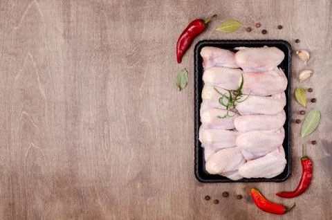 Raw chicken wings Stock Photos