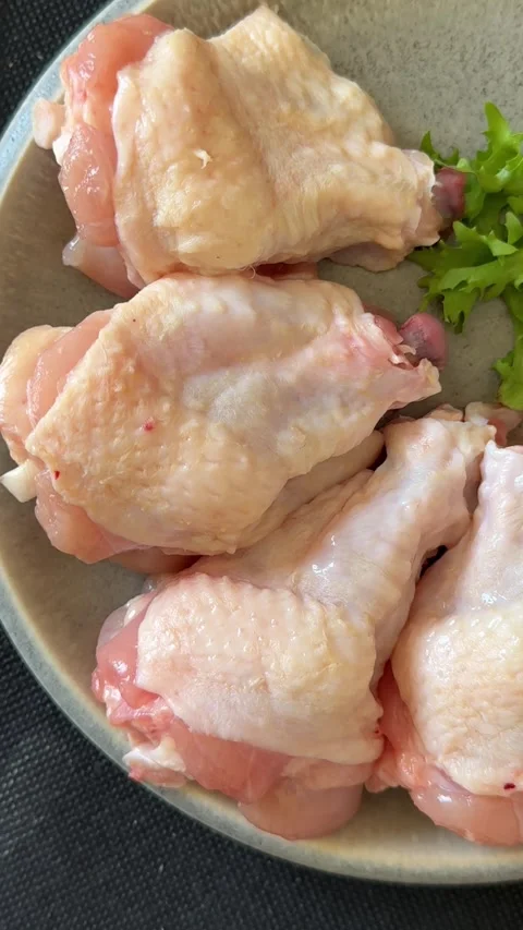 Raw chicken wings poultry meat main course lunch or dinner tasty Stock Footage 333926058
